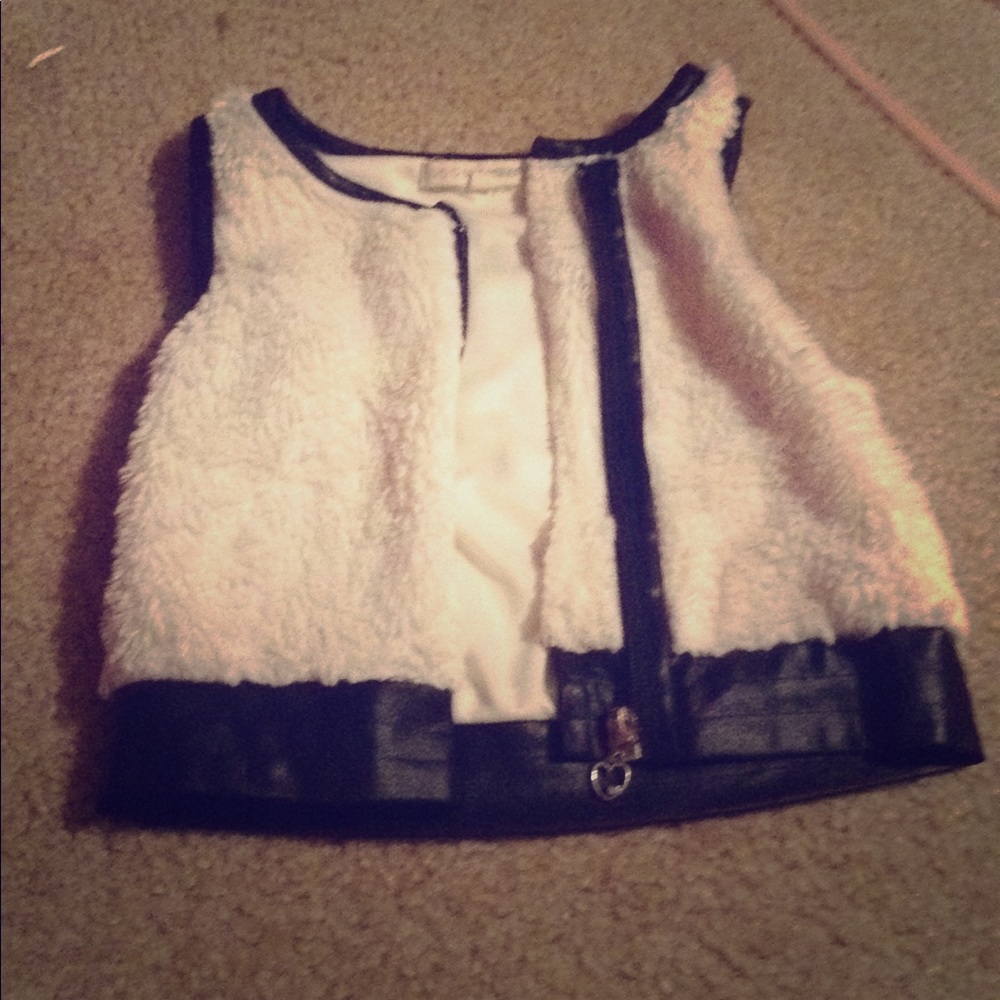Fluffy white vest